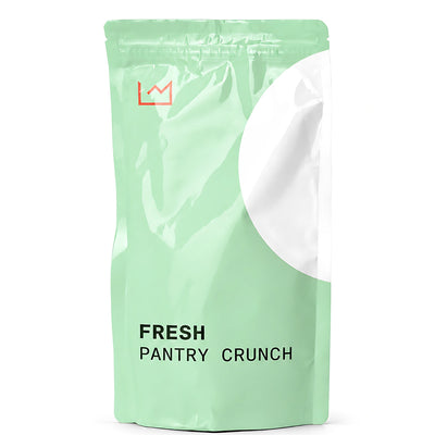 Fresh mint Pantry Crunch pouch on pure-white seamless studio. RawPNG and WebP95 delivery1536x2048 inspected; exact pouch/crescent/coral crown retained, all former diet/certification text removed, no props.