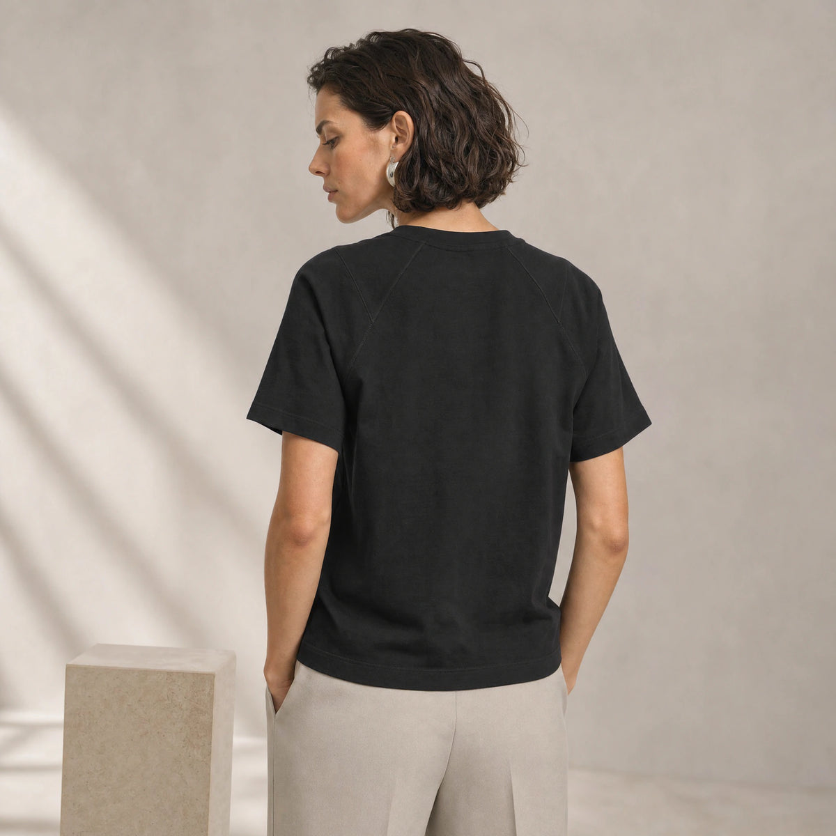 Arden Raglan Tee in Carbon Black, rear view