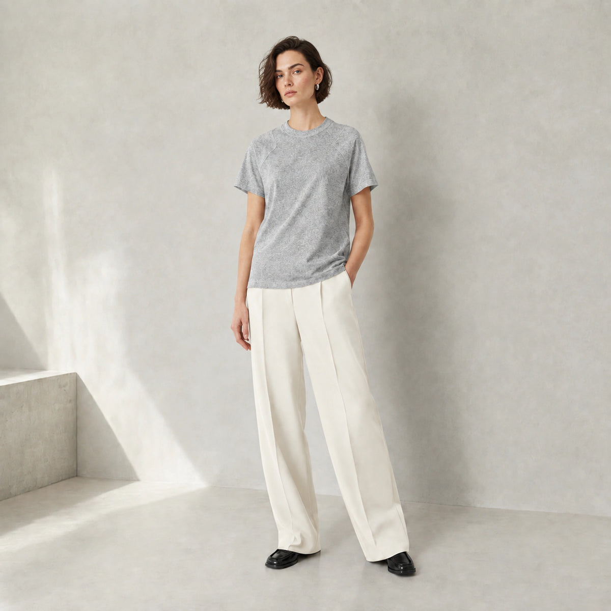 Arden Raglan Tee in Heather Grey, three-quarter view