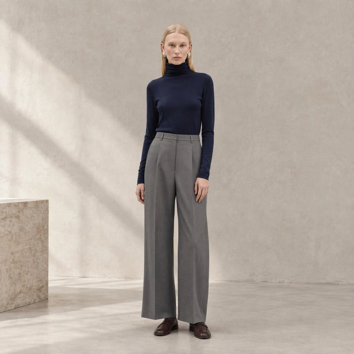 Elowen Merino Rollneck in Dark Navy, three-quarter look