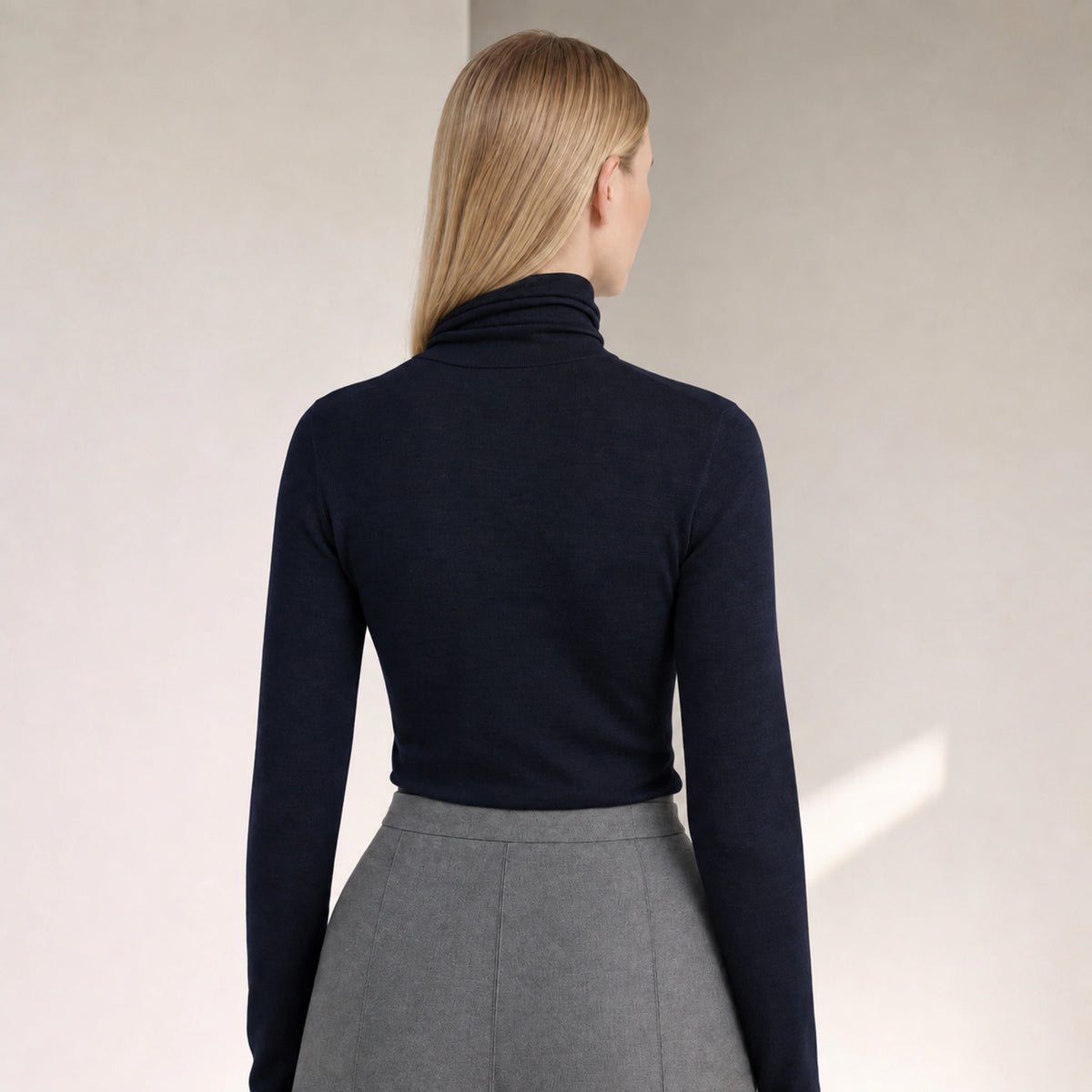 Elowen Merino Rollneck in Dark Navy, rear portrait