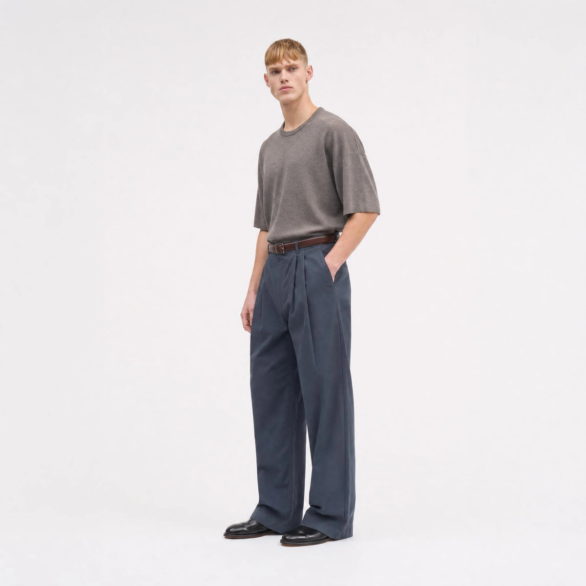 Mercer Pleat Trousers in Slate Blue, side three-quarter view
